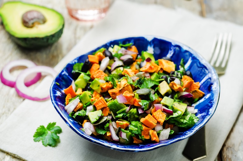 Toss Black Beans into A Salad