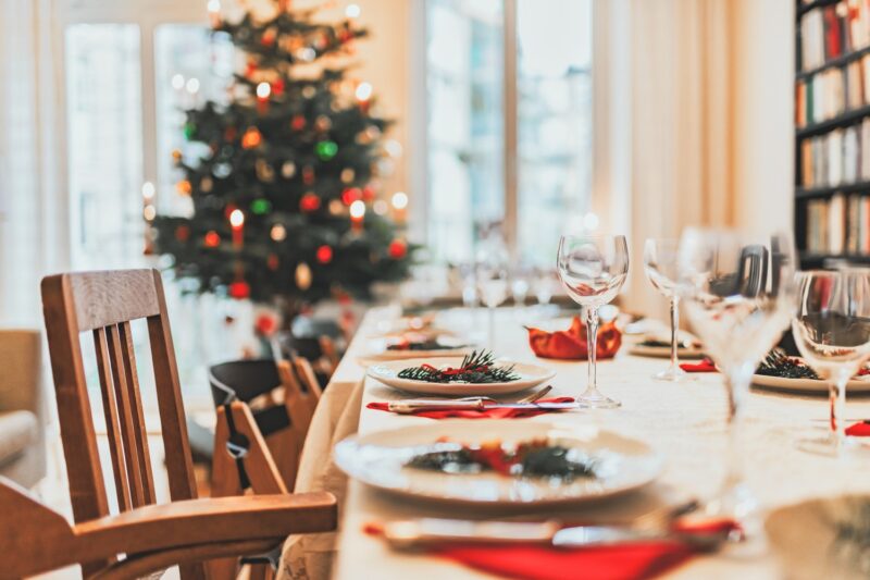 holiday dinner table decorated for Christmas