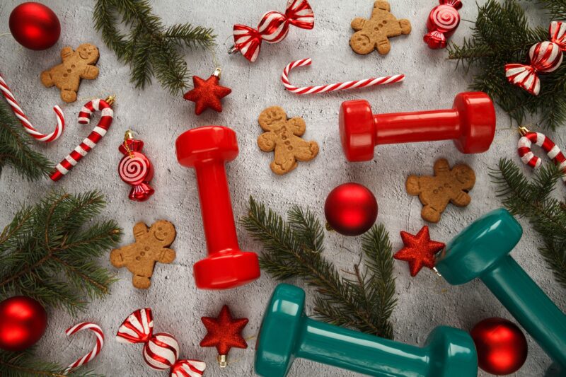 Dumbbells, Christmas tree branches, gingerbread man cookies, candy canes decorations, decor pendant ornaments.