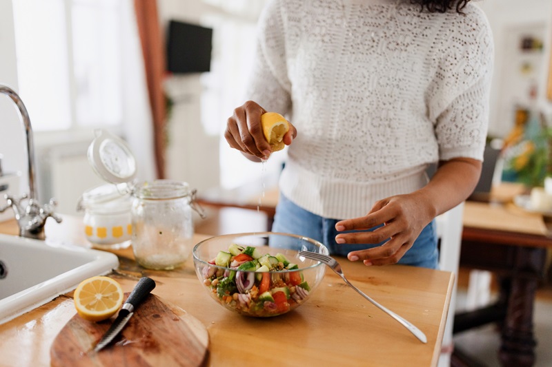 woman making a salad