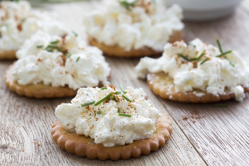 healthy high protein snack of cottage cheese on crackers