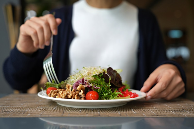 woman Mindful Eating a salad