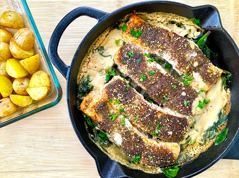 Mediterranean Za’atar Salmon with Garlic Tahini Sauce and spinach
