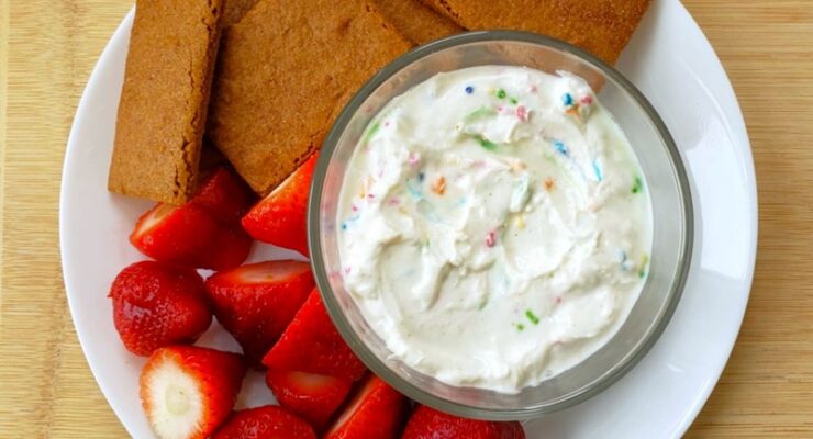 High Protein Cake Batter Dip with fresh strawberries and graham crackers