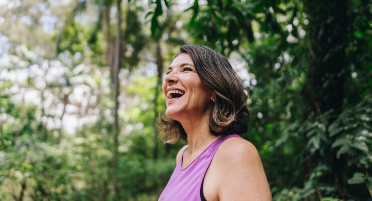 happy woman smiling outside